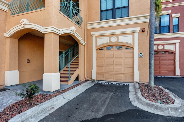 entrance to property featuring a garage