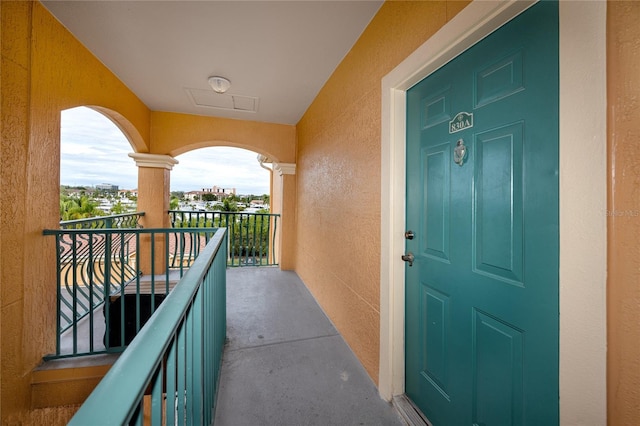 doorway to property featuring a balcony