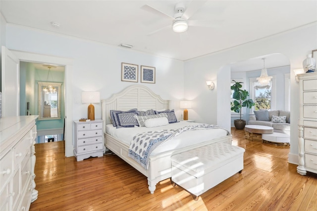 bedroom featuring light wood-type flooring and ceiling fan