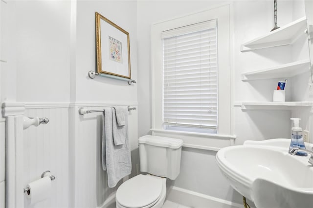 bathroom with sink and toilet