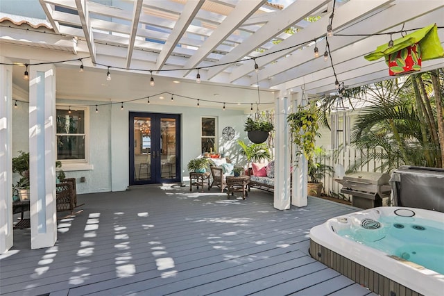 wooden terrace featuring french doors, area for grilling, and a pergola