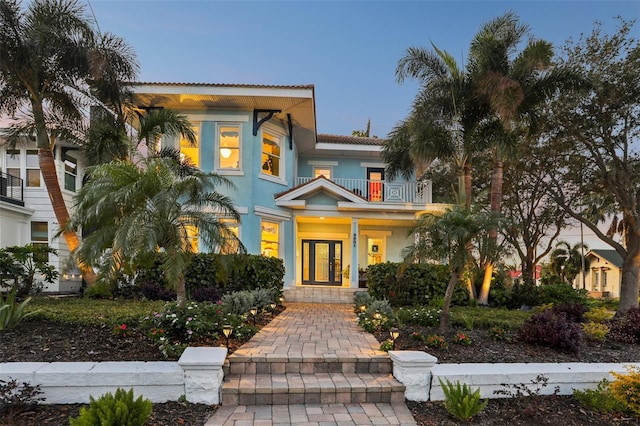 view of front of house with a balcony