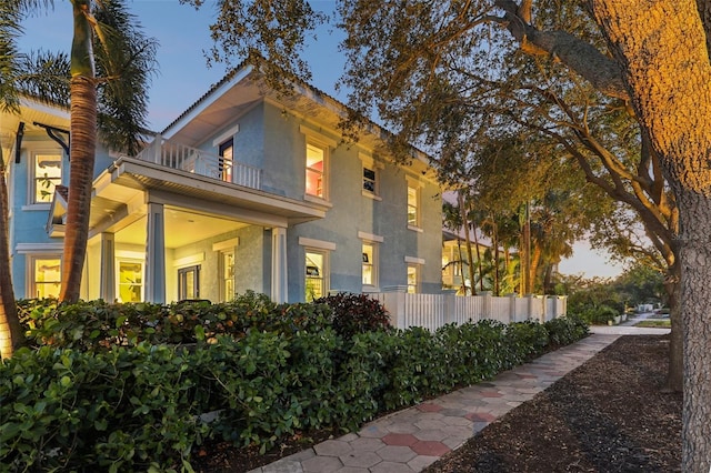 view of property exterior with a balcony