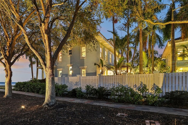 view of property exterior at dusk