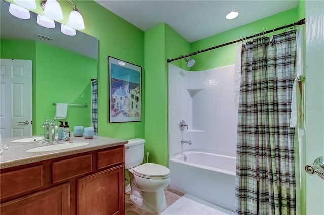 full bathroom featuring tile patterned floors, vanity, shower / bath combo, and toilet