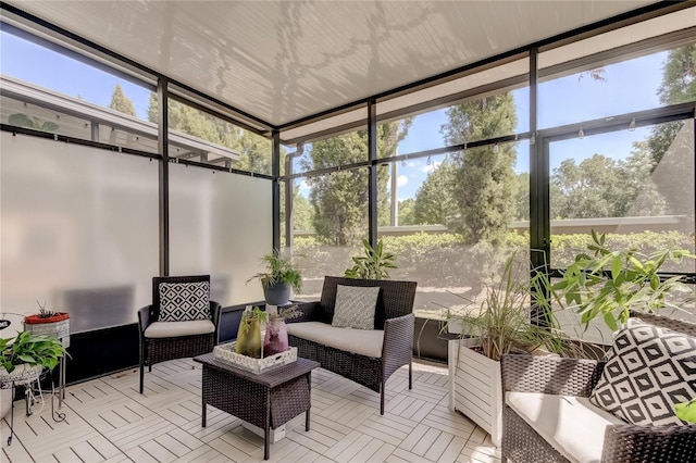 sunroom / solarium with a wealth of natural light