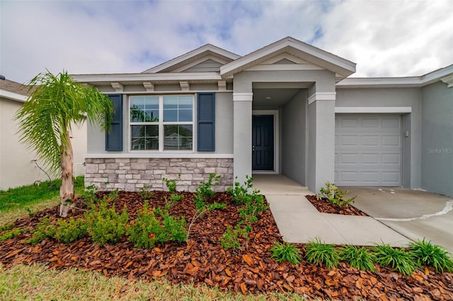 view of front of property with a garage