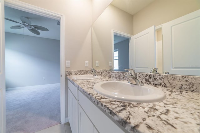 bathroom featuring vanity and ceiling fan