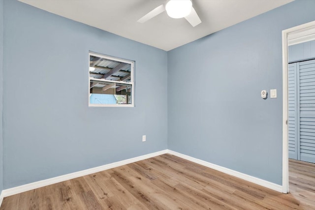 unfurnished room with light hardwood / wood-style floors and ceiling fan