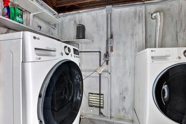 laundry room featuring washer / dryer