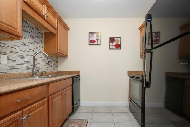 kitchen with decorative backsplash, sink, light tile patterned flooring, and black appliances