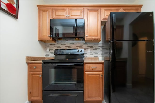 kitchen with decorative backsplash and black appliances