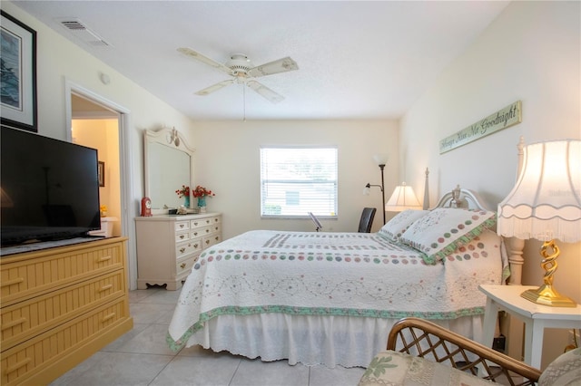 bedroom featuring ceiling fan and light tile patterned floors