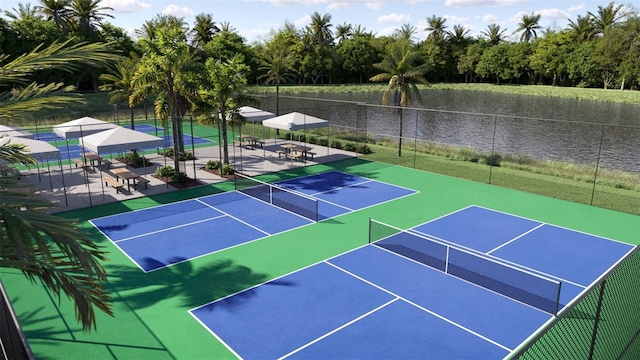 view of sport court with a water view