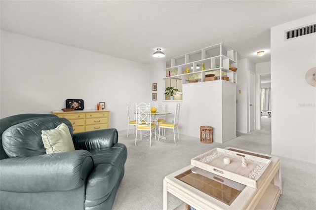 living room featuring light colored carpet