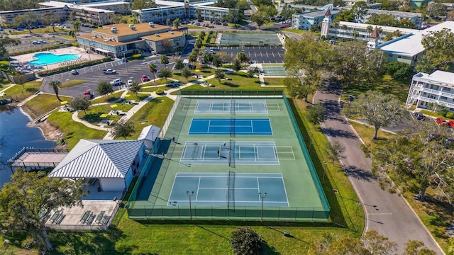 birds eye view of property with a water view