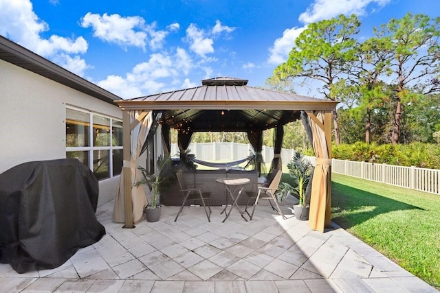 view of patio / terrace featuring a gazebo and area for grilling