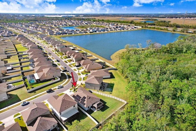 drone / aerial view with a water view