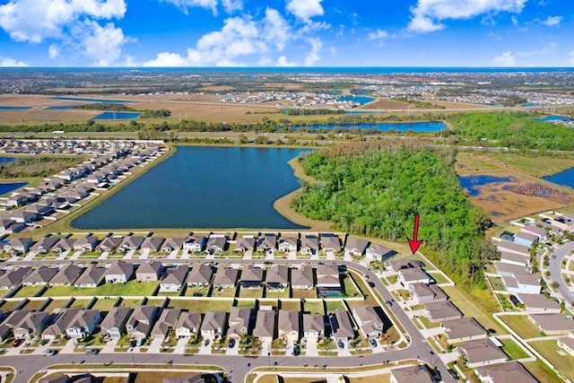 bird's eye view with a water view