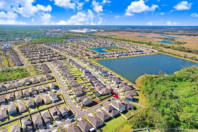 bird's eye view with a water view