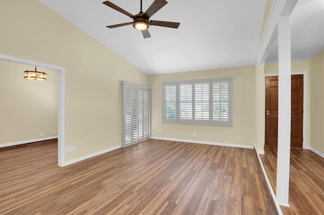 unfurnished bedroom with hardwood / wood-style flooring, ceiling fan, and lofted ceiling