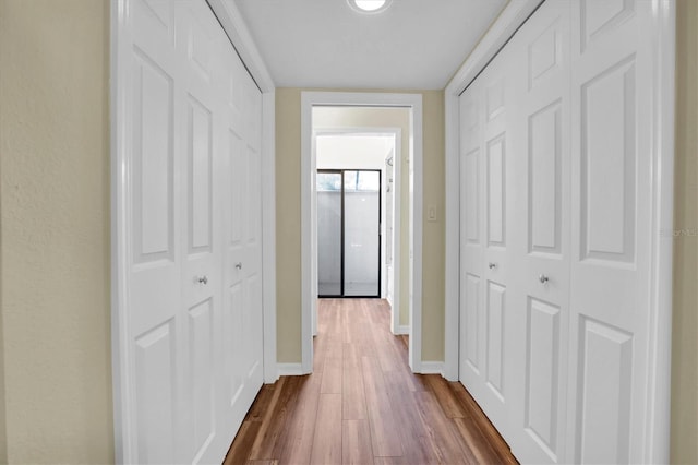 hallway featuring hardwood / wood-style floors