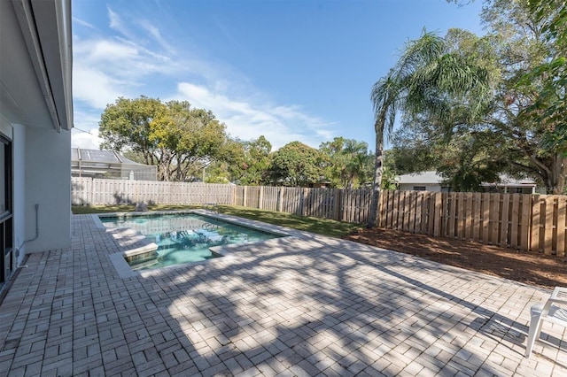 view of pool featuring a patio area