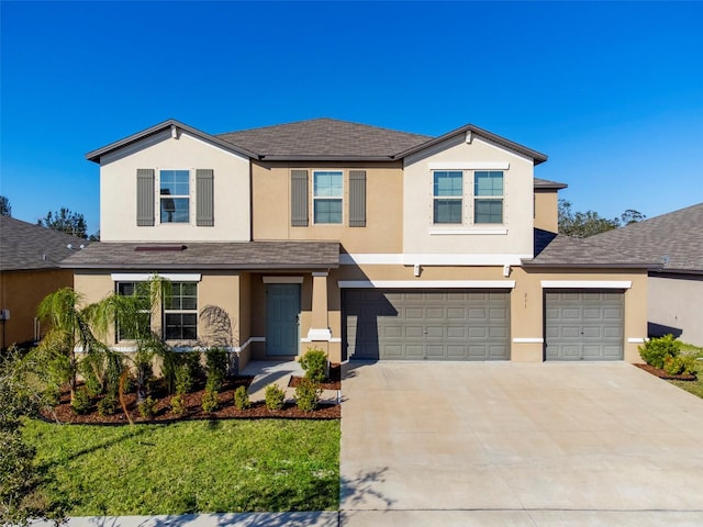 view of front of house with a garage