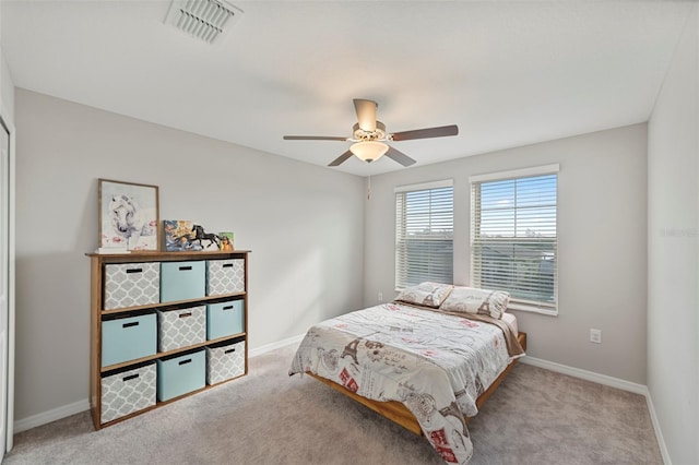 carpeted bedroom featuring ceiling fan