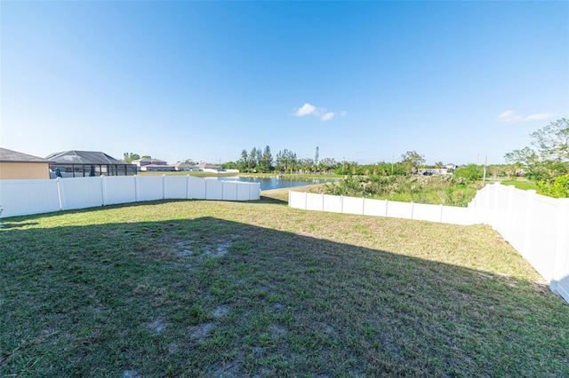 view of yard with a water view