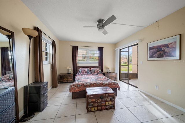 tiled bedroom with ceiling fan