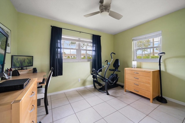 office area featuring plenty of natural light, ceiling fan, and light tile patterned floors