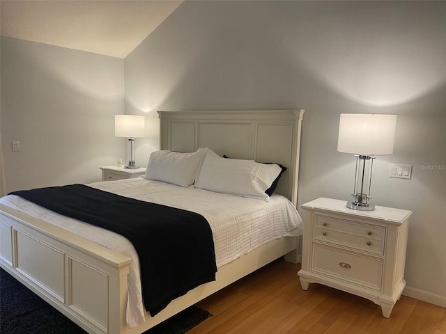 bedroom featuring hardwood / wood-style flooring