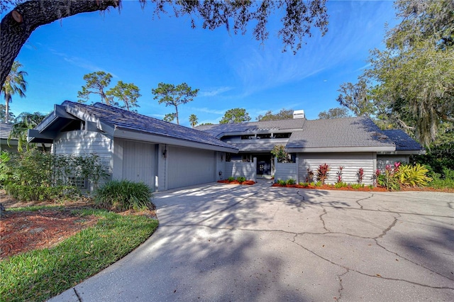 view of front of property featuring a garage