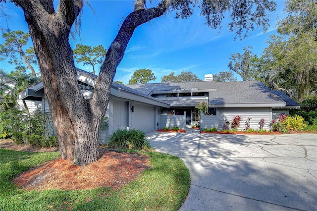 view of front of home with a garage