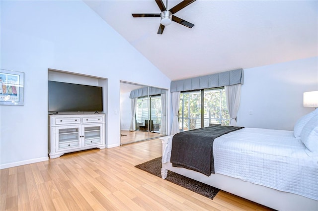 bedroom featuring ceiling fan, high vaulted ceiling, and light hardwood / wood-style flooring