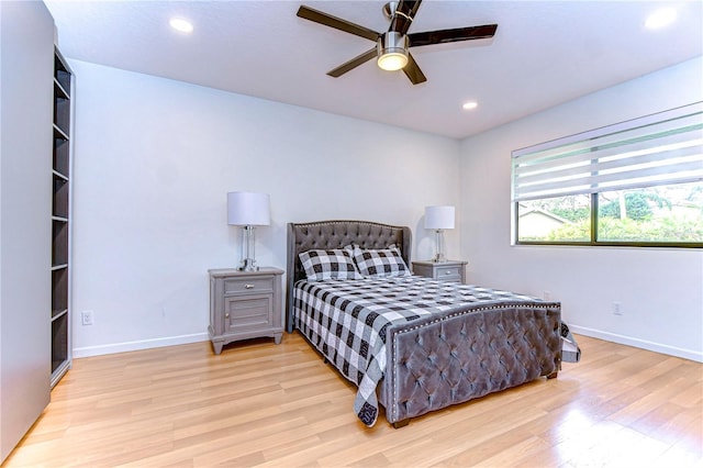 bedroom featuring ceiling fan and light wood-type flooring