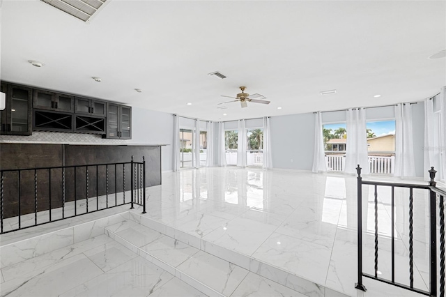 living room with ceiling fan