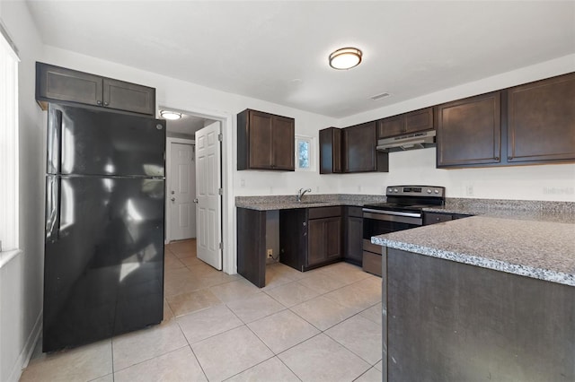 kitchen featuring black refrigerator, light stone counters, dark brown cabinets, stainless steel electric stove, and sink