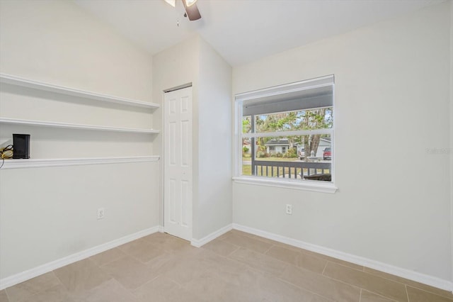 unfurnished room featuring ceiling fan