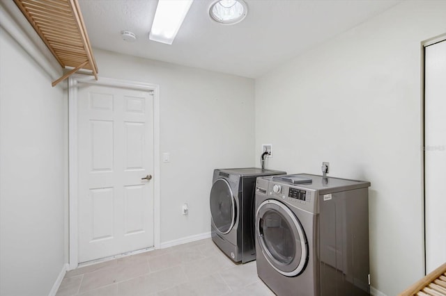 laundry room with washer and dryer