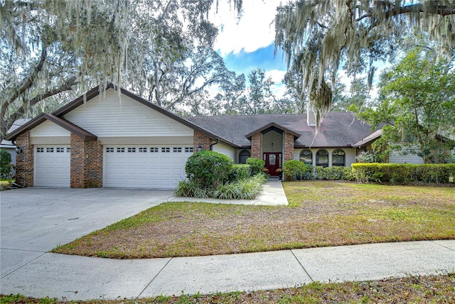 single story home featuring a garage