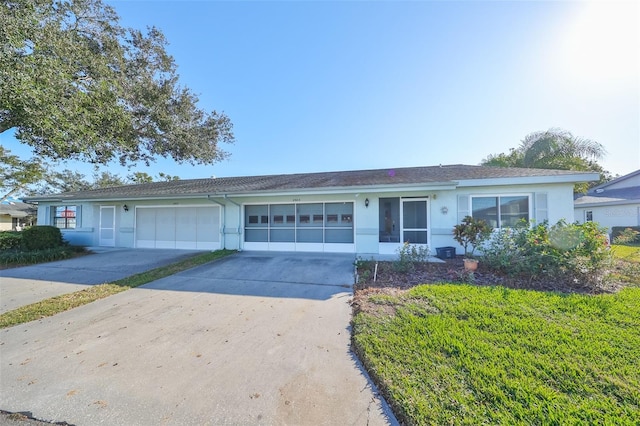 single story home with a garage