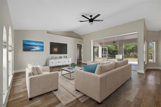 living room featuring ceiling fan, lofted ceiling, and hardwood / wood-style flooring