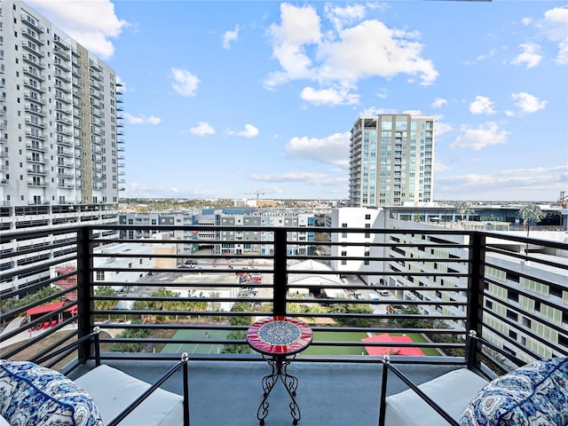 balcony featuring a city view