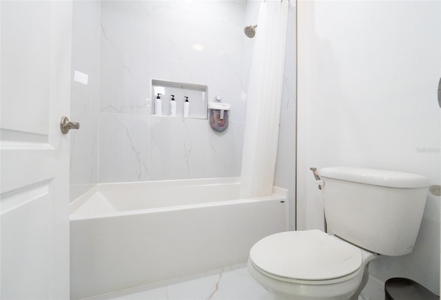 bathroom with shower / bath combo and toilet