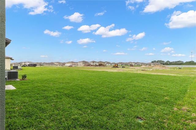 view of yard with central AC