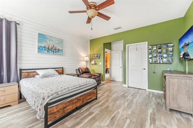 bedroom featuring ceiling fan and light wood-type flooring