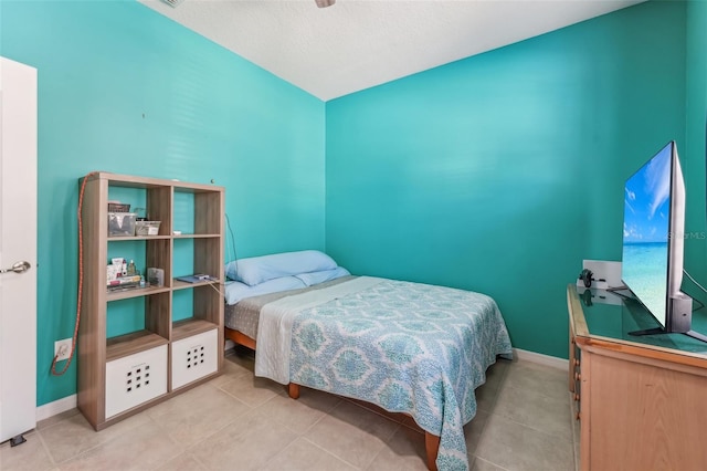 bedroom featuring a textured ceiling