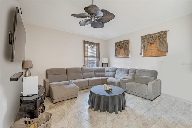 living room with ceiling fan